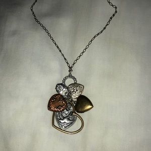 Long chain multiple pediment necklace